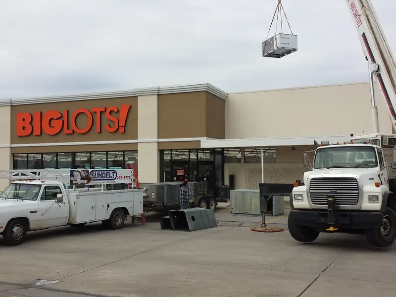 Rooftop unit going onto a retail store